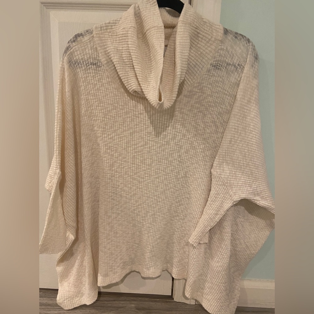 Free people Beach split back turtle neck sweater. Size medium.